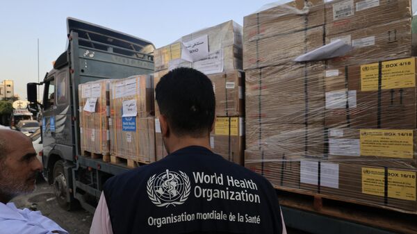 مساعدات طبية من منظمة الصحة العالمية تصل إلى مستشفى ناصر في خان يونس جنوب قطاع غزة في 23 أكتوبر 2023. - سبوتنيك عربي
