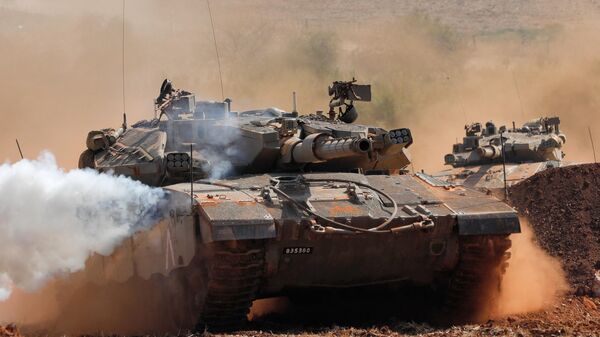 دبابات ميركافا الإسرائيلية في مناورة عسكرية بالقرب من الحدود مع لبنان - سبوتنيك عربي