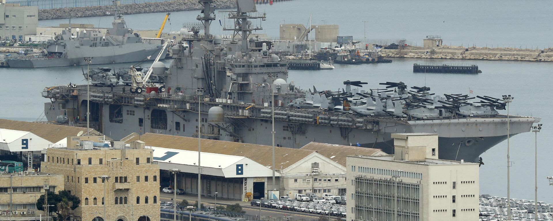 السفينة الهجومية الأمريكية يو إس إس إيو جيما راسية في ميناء حيفا شمال إسرائيل في 15 مارس 2018 - سبوتنيك عربي, 1920, 10.04.2024