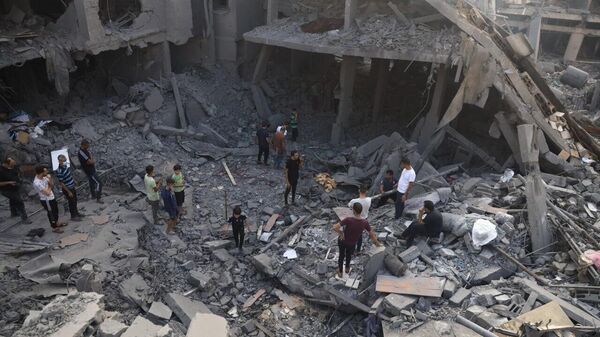 الموت كان في كل مكان صور لـسبوتنيك من عمليات الإخلاء في قطاع غزة - سبوتنيك عربي