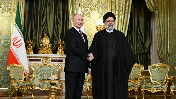 الرئيس الروسي فلاديمير بوتين والرئيس الإيراني إبراهيم رئيسي خلال اجتماع في موسكو، روسيا 7 ديسمبر 2023 - سبوتنيك عربي
