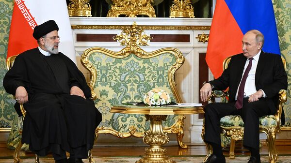 الرئيس الروسي فلاديمير بوتين والرئيس الإيراني إبراهيم رئيسي خلال اجتماع في موسكو، روسيا 7 ديسمبر 2023 - سبوتنيك عربي
