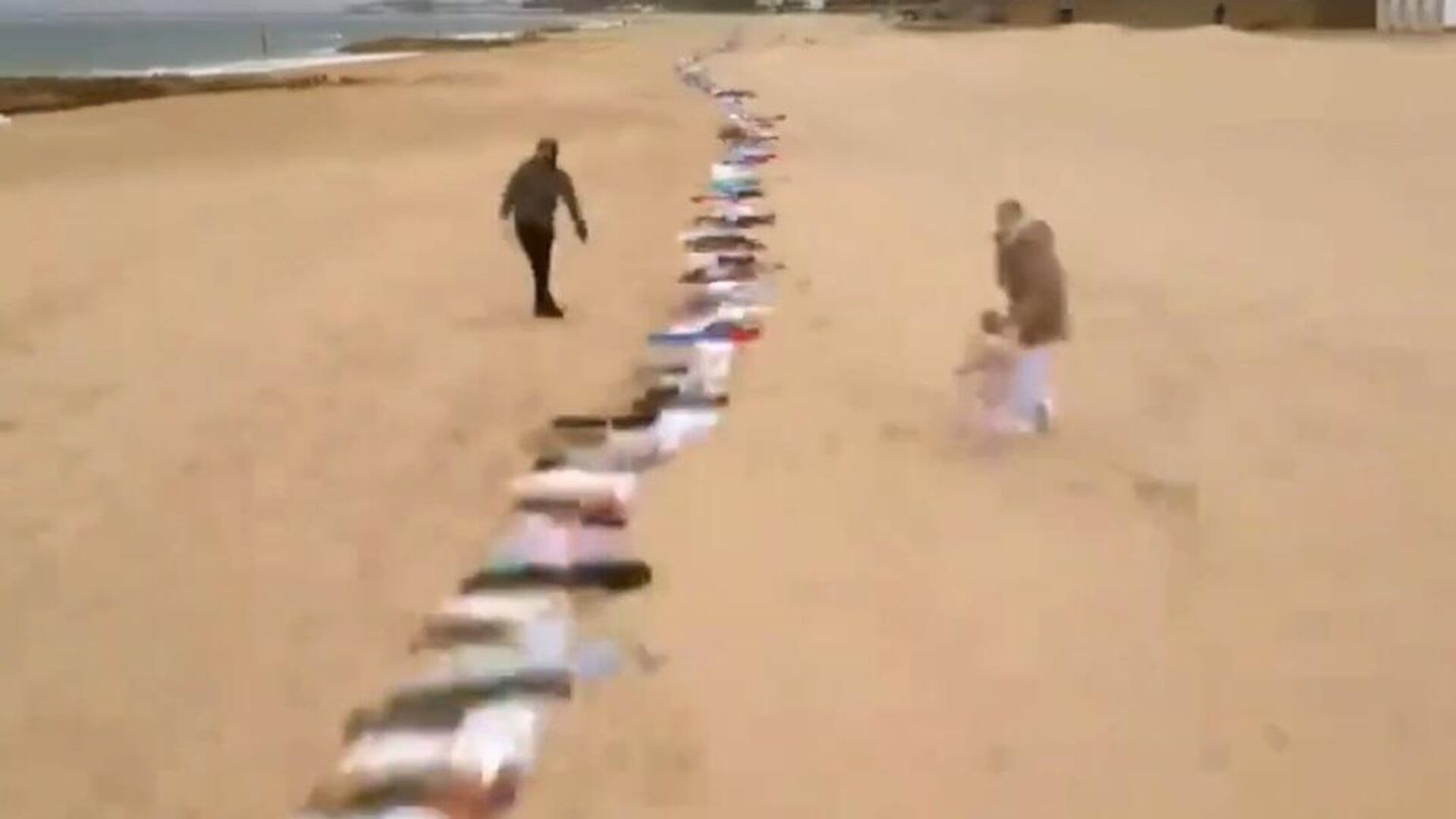 شاطئ بريطاني يجسد معاناة أطفال غزة  - سبوتنيك عربي, 1920, 07.02.2024