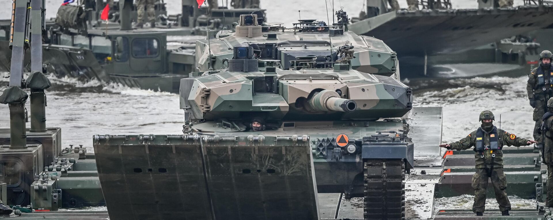 دبابة من طراز ليوبارد 2أ4 تصل خلال مناورة عسكرية التنين-24، وهي جزء من مناورات المدافع الصامد 2024، التابعة لحلف الناتو في كورزينيوو، شمال بولندا، في 4 مارس 2024. - سبوتنيك عربي, 1920, 04.04.2024