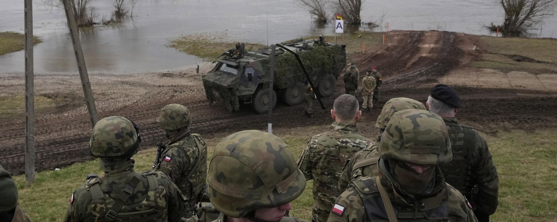 قوات مسلحة خلال مناورة عسكرية التنين-24، وهي جزء من مناورات المدافع الصامد 2024، التابعة لحلف الناتو في كورزينيوو، شمال بولندا، في 4 مارس 2024. - سبوتنيك عربي, 1920, 04.04.2024