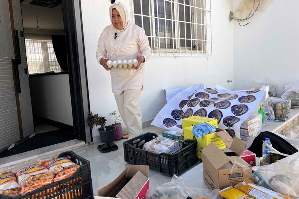 حملة &quot;دينار لتجهيز سلة رمضان&quot; في ليبيا - سبوتنيك عربي
