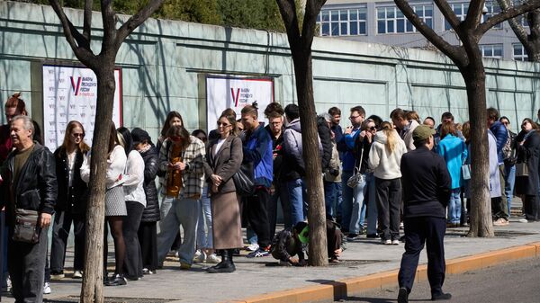 الانتخابات الرئاسية الروسية 2024 - التصويت للمواطنين الروس في بكين، الصين - سبوتنيك عربي