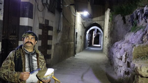 أصوات المسحراتية تملأ أزقة دمشق القديمة بعد 13 عاماً على الغياب - سبوتنيك عربي
