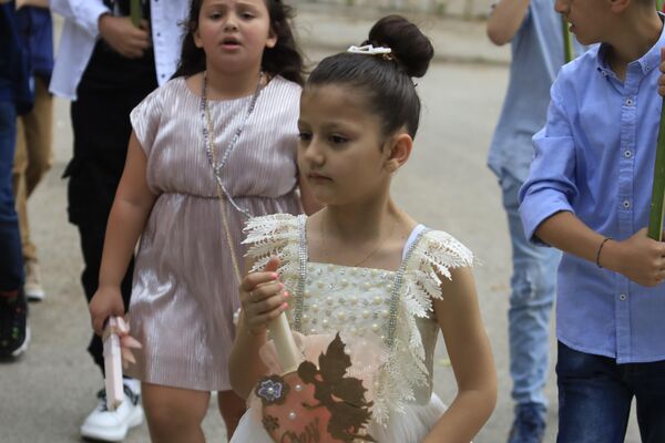 احتفالات أحد الشعانين في جنوب لبنان... فرحة بالرغم من المواجهات - سبوتنيك عربي