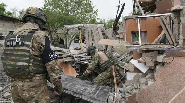 تداعيات قصف القوات المسلحة الأوكرانية في حي كيروف في دونيتسك - سبوتنيك عربي