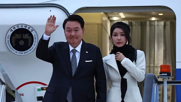 رئيس كوريا الجنوبية، يون سوك يول، وزوجته، كيم كيون هي - سبوتنيك عربي