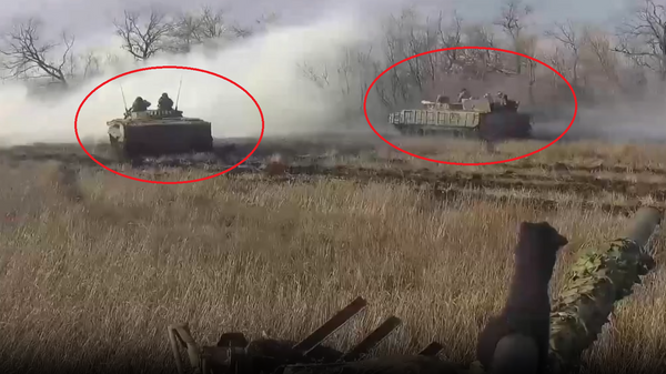 اقتحام الدبابات الروسية بلدة نوفوميخايلوفكا وتحريرها - سبوتنيك عربي