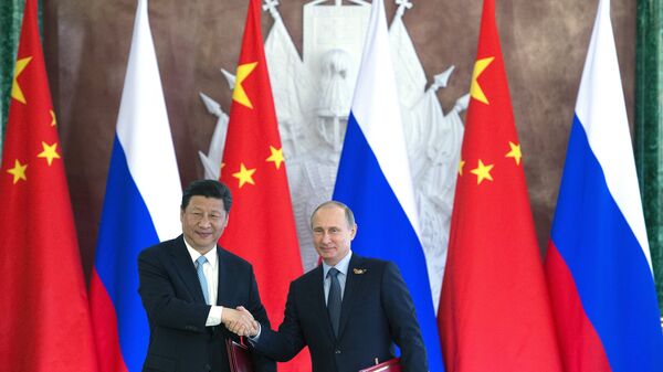 لقاء الرئيسين الروسي فلاديمير بوتين والصيني شي جين بينغ - سبوتنيك عربي
