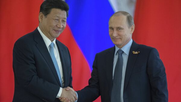 لقاء الرئيسين الروسي فلاديمير بوتين والصيني شي جين بينغ - سبوتنيك عربي