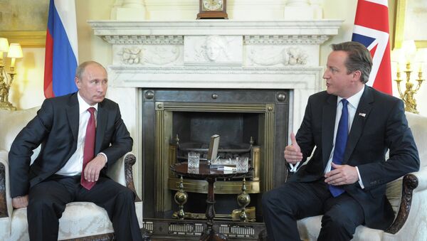 الرئيس الروسي فلاديمير بوتين أثناء قيامه بزيارة عمل إلى بريطانيا عام 2012 - سبوتنيك عربي