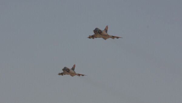 Two Egyptian Air Force Mirage fighter jets execute a bombing run - سبوتنيك عربي