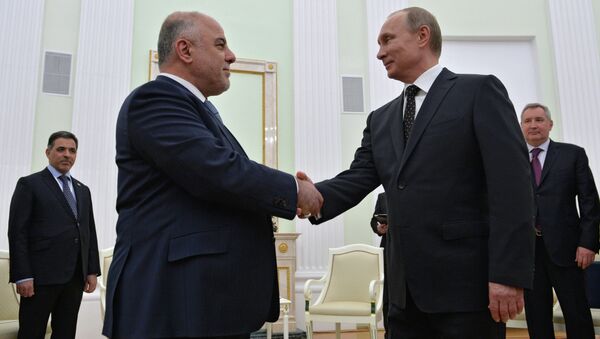 الرئيس بوتين لدى استقباله رئيس الوزراء العراقي حيدر العبادي - سبوتنيك عربي