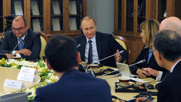 لقاء بوتين مع رؤساء كبريات وكالات الأنباء العالمية - سبوتنيك عربي
