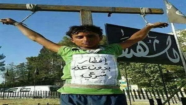 داعش يصلب أطفال في عام 2014 - سبوتنيك عربي