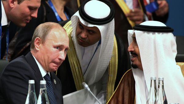الرئيس الروسي فلاديمير بوتين مع العاهل السعودي  الملك سلمان بن عبد العزيز - سبوتنيك عربي