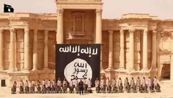 أطفال داعش ينفذون عملية إعدام جماعية على مدرجات المسرح الروماني فى تدمر - سبوتنيك عربي