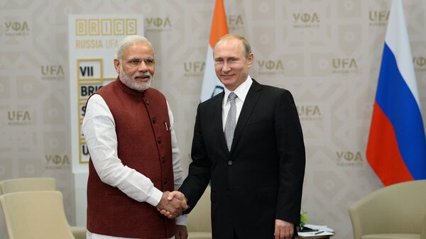 الرئيس الروسي فلاديمير بوتين خلال لقائه مع رئيس الوزراء الهندي نارندرا مودي - سبوتنيك عربي
