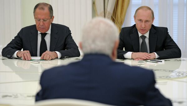 الرئيس بوتين خلال اجتماع عمل مع وزير الخارجية السوري - سبوتنيك عربي