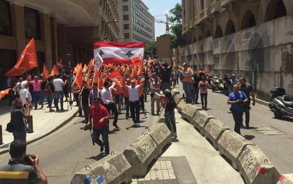 الثورة البرتقالية إحتجاجاً على تهميش المسيحيين - سبوتنيك عربي