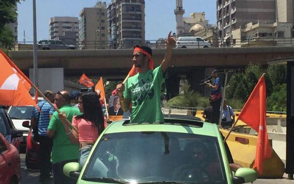 الثورة البرتقالية إحتجاجاً على تهميش المسيحيين - سبوتنيك عربي