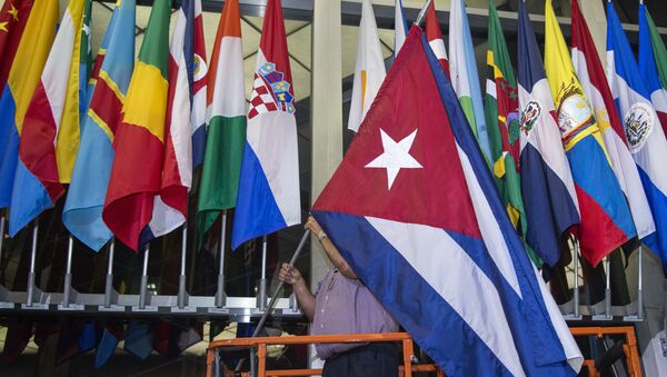 رفع العلم الكوبي على مدخل وزارة الخارجية الأمريكية - سبوتنيك عربي