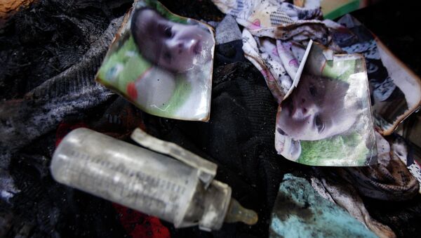 مقتل طفل فلسطيني عمره 18 شهرا - سبوتنيك عربي