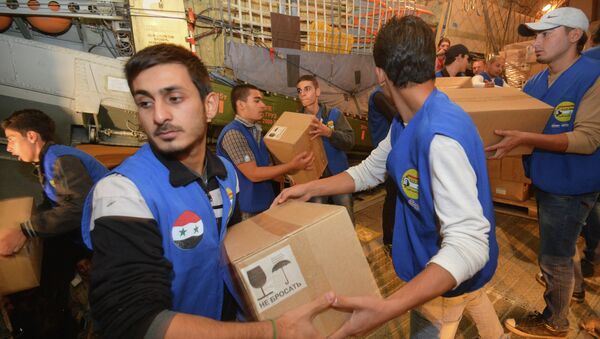 صناديق من المساعدات الإنسانية للشعب السوري - سبوتنيك عربي