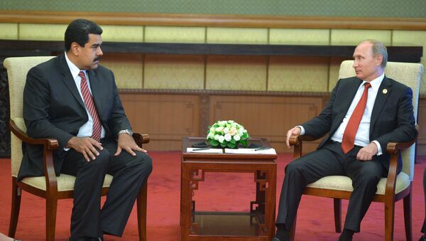 الرئيس الفنزويلي نيكولاس مادورو والرئيس الروسي فلاديمير بوتين - سبوتنيك عربي
