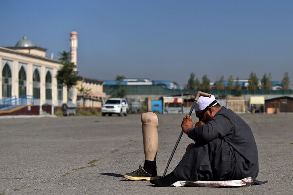 مسلم أفغاني متسول خلال الاحتفال بعيد الأضحى في كابول - سبوتنيك عربي