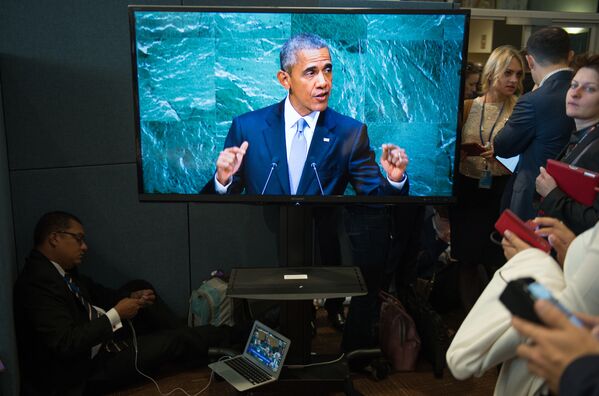 الصحفيون يستمعون إلى خطاب الرئيس الأمريكي باراك أوباما خلال الدورة الـ70 للجمعية العامة للأمم المتحدة - سبوتنيك عربي