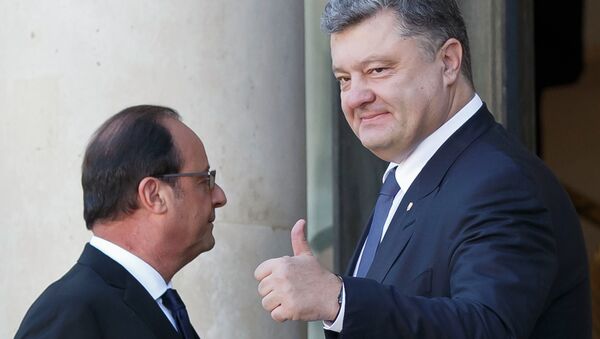 الرئيس الأوكراني بيوتر بوروشينكو والرئيس الفرنسي فرانسوا هولاند - سبوتنيك عربي