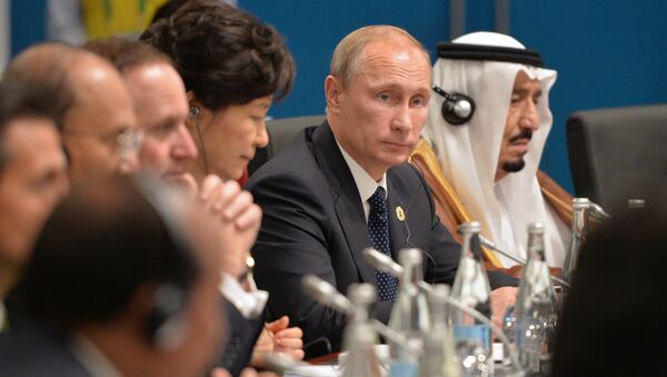 الرئيس الروسي فلاديمير بوتين والعاهل السعودي سلمان بن عبد العزيز - سبوتنيك عربي