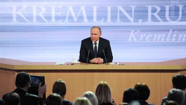الرئيس فلاديمير بوتين أثناء المؤتمر الصحفي في موسكو - سبوتنيك عربي