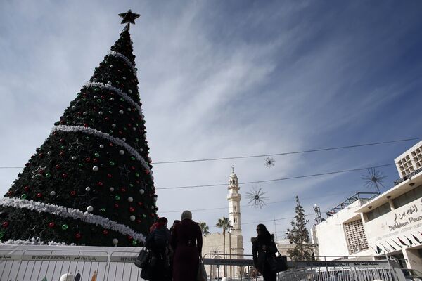 الفلسطينيون يستعدون لاستقبال عيد الميلاد المجيد في بيت لحم - سبوتنيك عربي