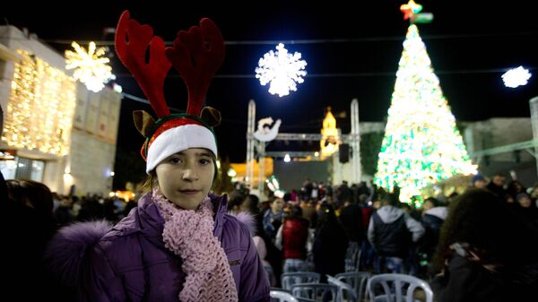 الفلسطينيون يستعدون لإستقبال عيد الميلاد المجيد في بيت لحم - سبوتنيك عربي