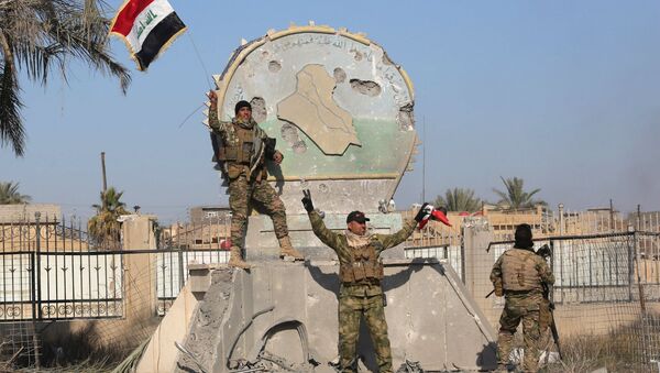 قوات الأمن العراقية بعد تحرير الرمادي من قبضة داعش - سبوتنيك عربي