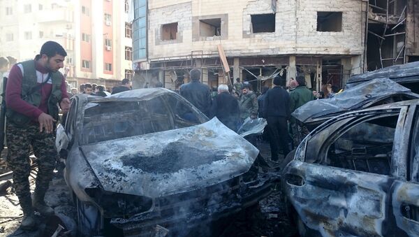 صورة أرشيفية لتفجير سيار مفخخة في حي السيدة زينب جنوب دمشق - سبوتنيك عربي