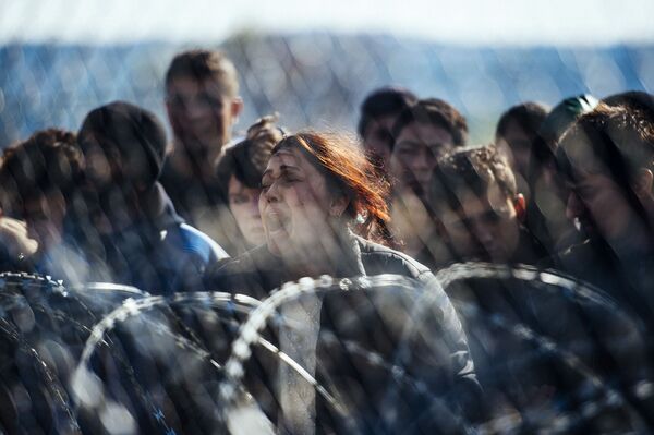 اللاجئون المحتجون على الحدود اليونانية-المقدونية، 2 مارس/ آذار 2016. - سبوتنيك عربي