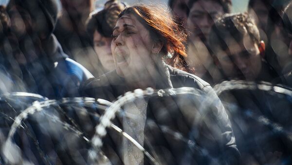 اللاجئون المحتجون على الحدود اليونانية-المقدونية، 2 مارس/ آذار 2016. - سبوتنيك عربي