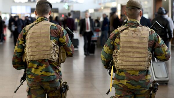 Military police soldiers patrol the Brussels Airport on in Zaventem, eastern Brussels (File) - سبوتنيك عربي
