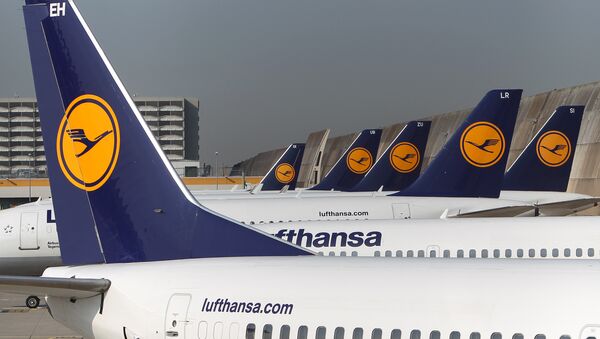 FILES - Aircrafts of German airline Lufthansa stand in park position at the airport in Frankfurt am Main, western Germany. - سبوتنيك عربي