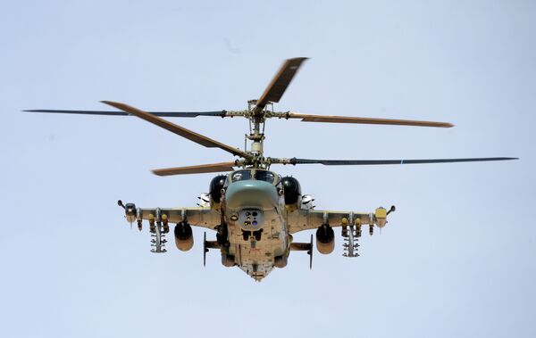 قوات الجيش العربي السوري يستخدمون المروحية الروسية كا-52 أليغاتور خلال العمليات العسكرية لتحرير مدينة القريتين من تنظيم داعش. - سبوتنيك عربي