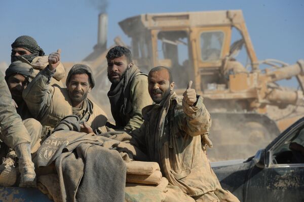 قوات الجيش العربي السوري يحررون مدينة القريتين في سوريا. - سبوتنيك عربي