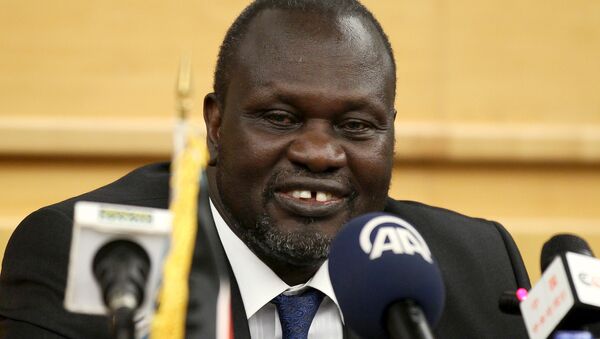 South Sudan's rebel leader Riek Machar prepares to address a news conference during the peace signing meeting in Ethiopia's capital Addis Ababa, August 17, 2015. - سبوتنيك عربي
