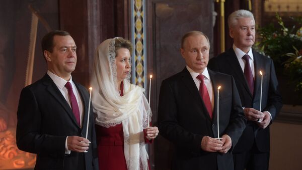 الرئيس الروسي فلاديمير بوتين في كاتدرائية المسيح المخلص في موسكو - سبوتنيك عربي